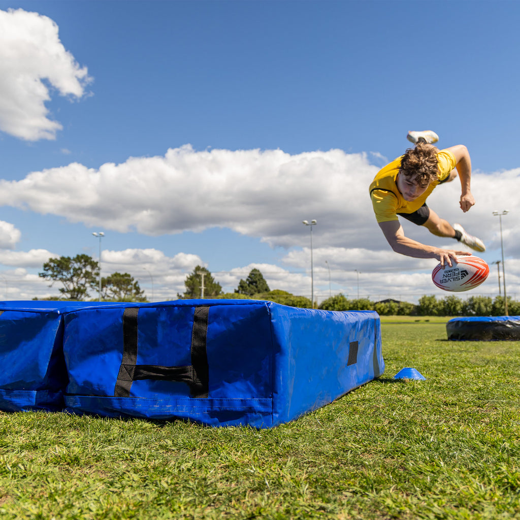 Silver Fern Folding Tackle Mat, lifestyle shot, player diving onto mat